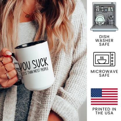 Lifestyle Photo #3 You Suck, Less Than Most Mug