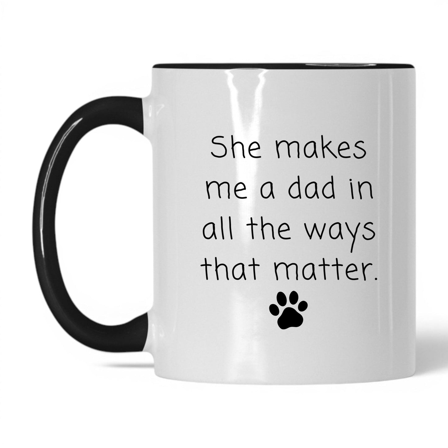 She Makes Me a Dad Mug – 11oz White/Black Mug