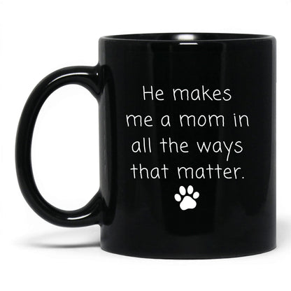 He Makes Me a Mom Mug – 11oz Black Mug