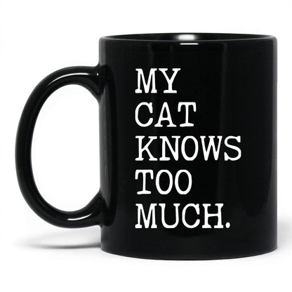 My Cat Knows Too Much 11oz black coffee mug