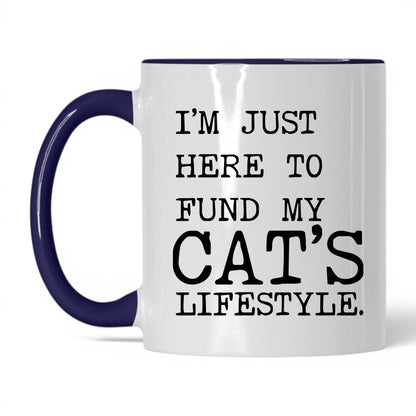 I’m Just Here to Fund My Cat’s Lifestyle 11oz white and midnight blue coffee mug
