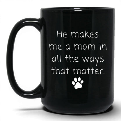 He Makes Me a Mom Mug – 15oz Black Mug