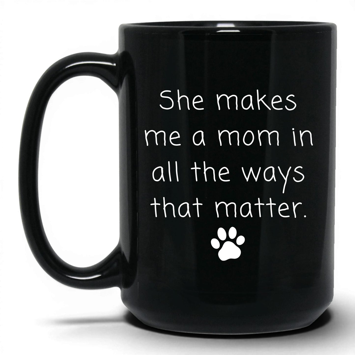 She Makes Me a Mom Mug – 15oz Black Mug