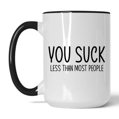 Lifestyle Photo #1 You Suck, Less Than Most Mug