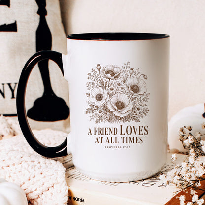 A Friend Loves at All Times coffee mug