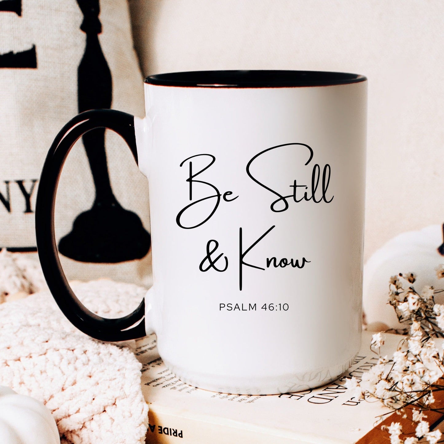 Be still and know Psalm 46:10 Christian coffee mug on desk