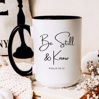 Be still and know Psalm 46:10 Christian coffee mug on desk