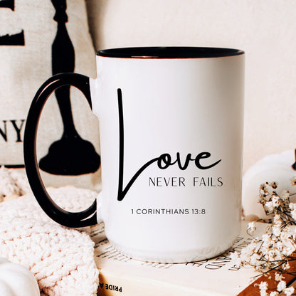Love never fails 1 Corinthians 13:8 Christian coffee mug