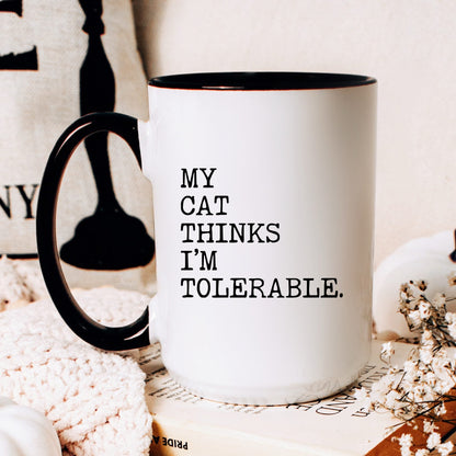 My Cat Thinks I’m Tolerable coffee mug
