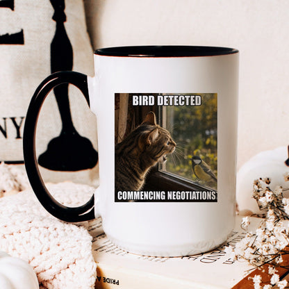 Bird detected commencing negotiations tabby cat coffee mug