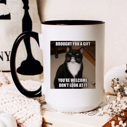 Brought you a gift tuxedo cat coffee mug