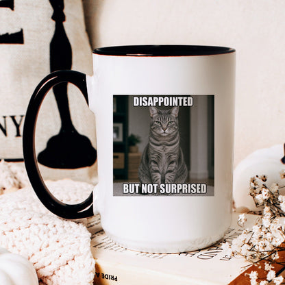 Disappointed but not surprised tabby cat coffee mug