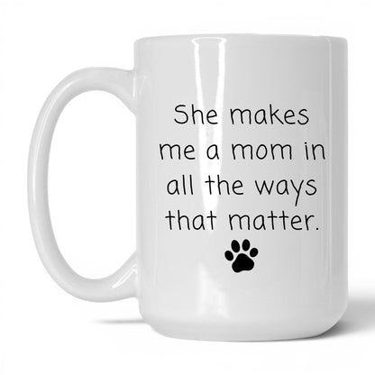 She Makes Me a Mom Mug – 15oz White Mug