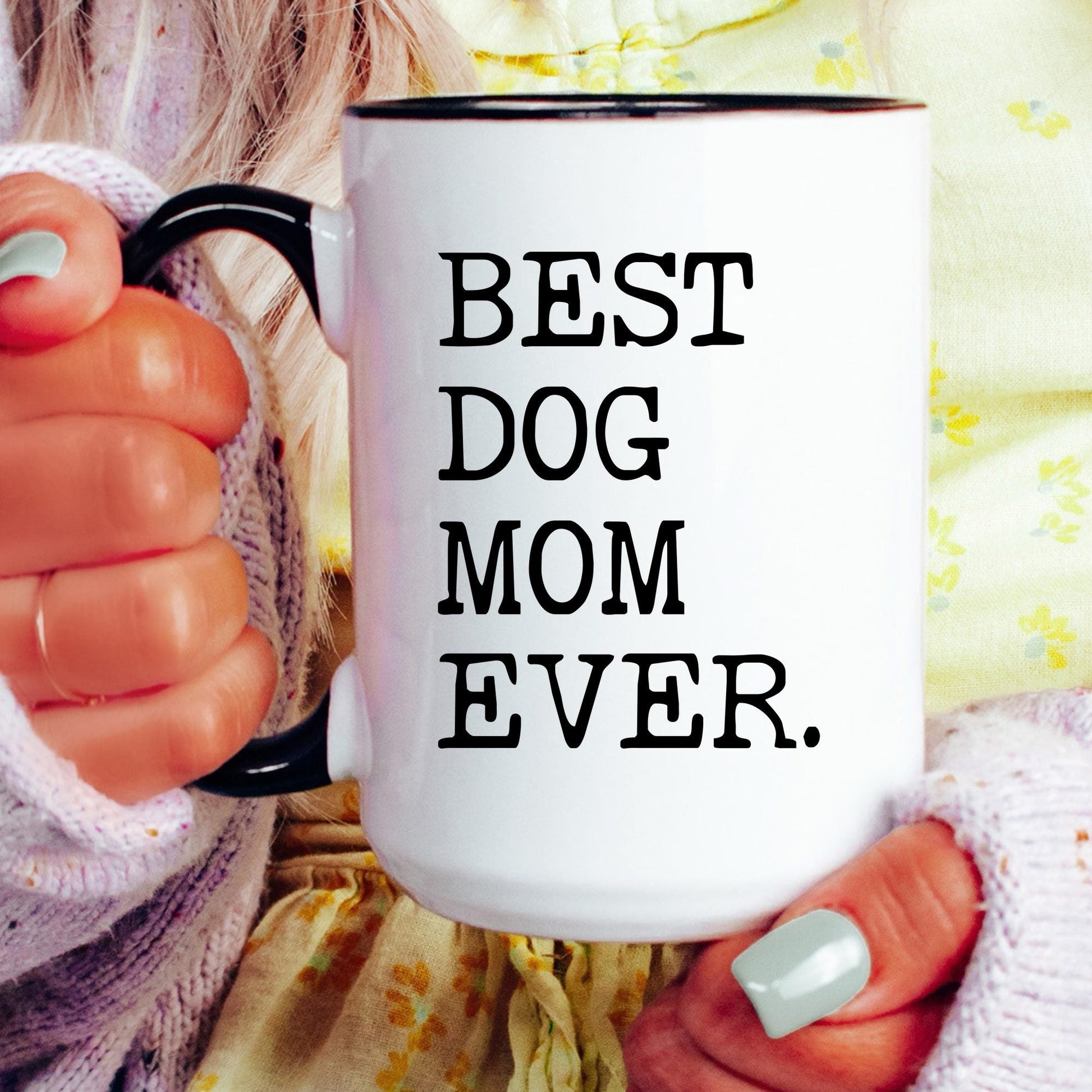 Best Dog Mom Ever coffee mug held by a model