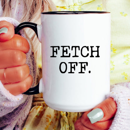 Fetch Off coffee mug held by a model