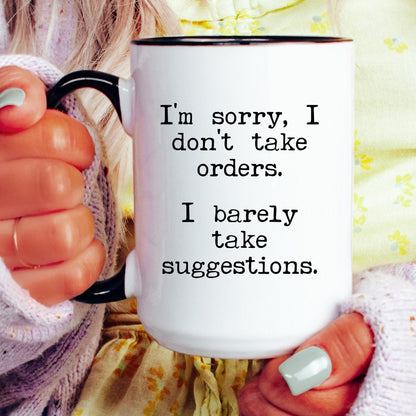 I Barely Take Suggestions coffee mug held in hand