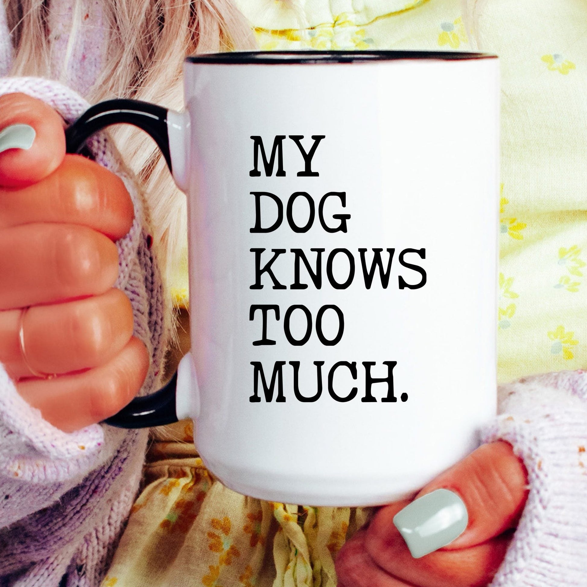 My Dog Knows Too Much coffee mug held by a model