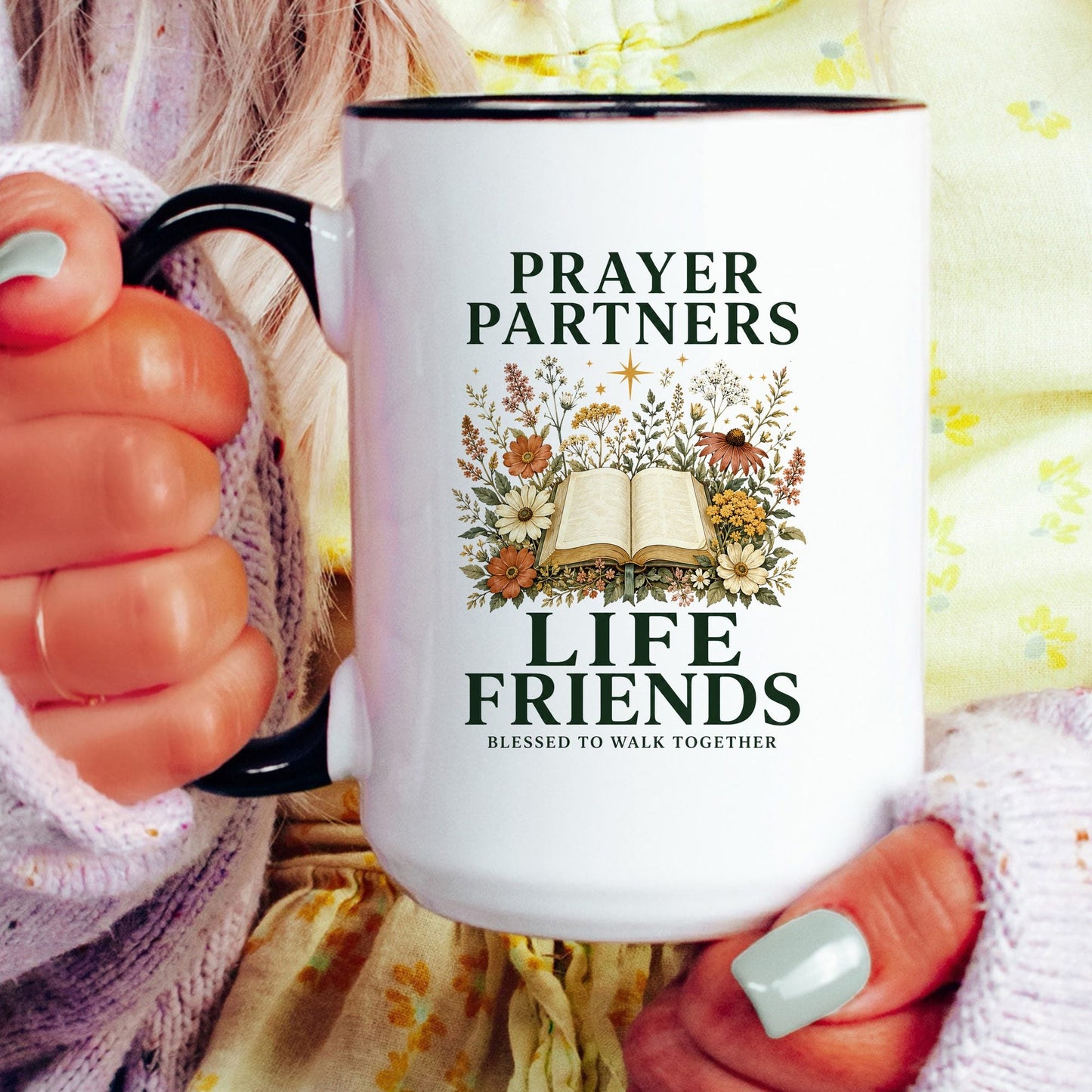 Prayer Partners, Life Friends coffee mug held by a model