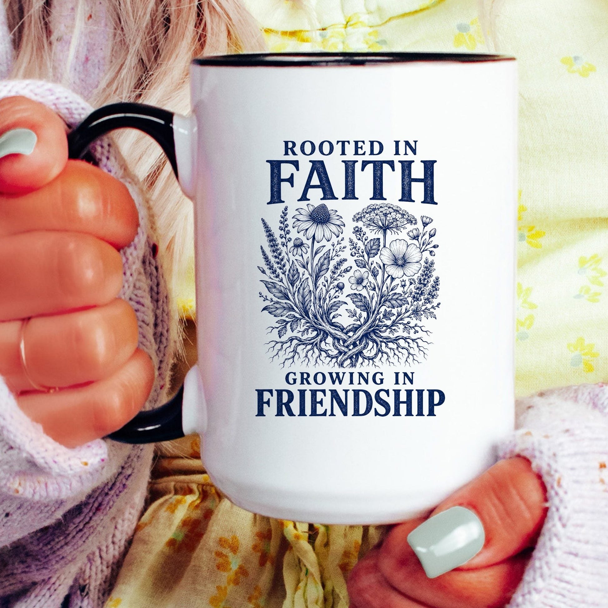 Rooted in Faith, Growing in Friendship coffee mug held by a model