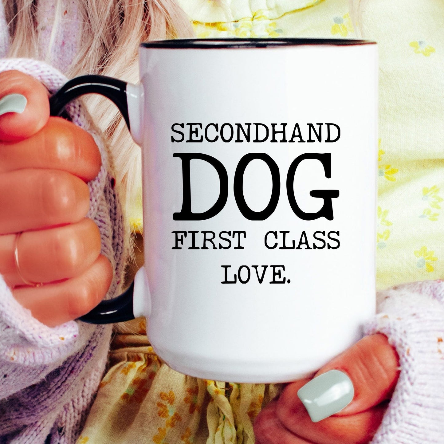 Secondhand Dog First Class Love coffee mug held by a model