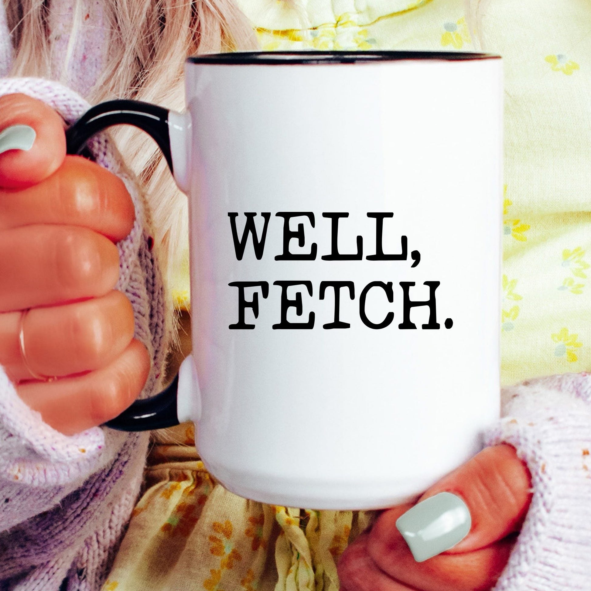 Well Fetch coffee mug held by a model
