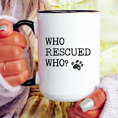 Who Rescued Who Dog coffee mug held by a model
