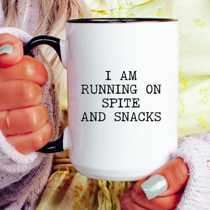 running on spite and snacks coffee mug
