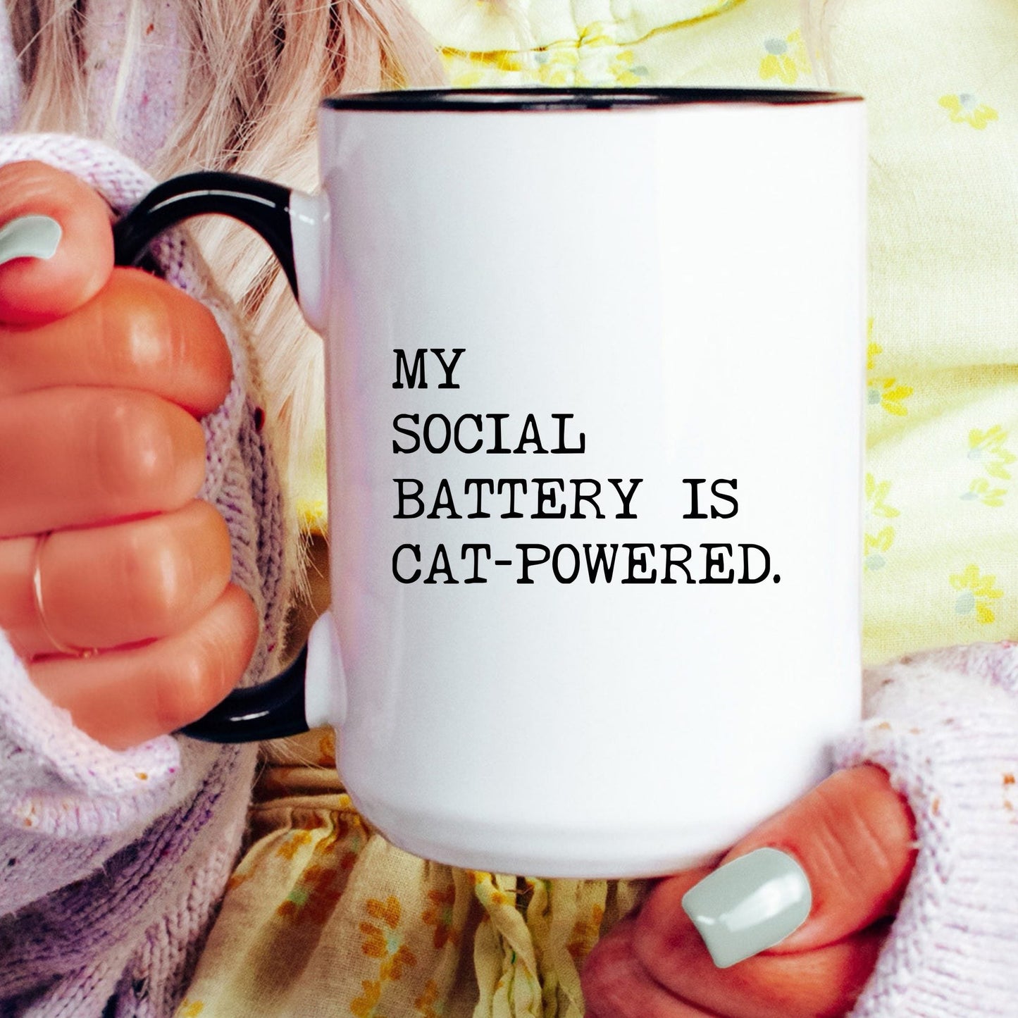 My Social Battery Is Cat-Powered coffee mug held by a model