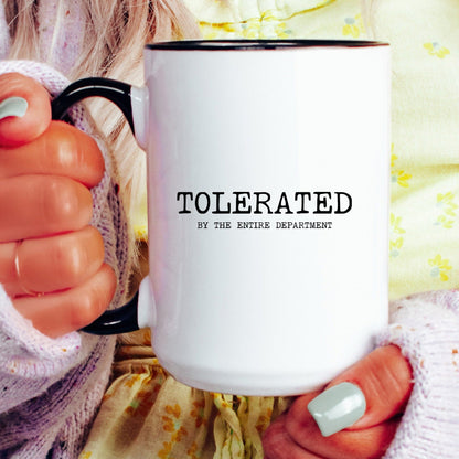 Tolerated by the entire department funny coworker coffee mug