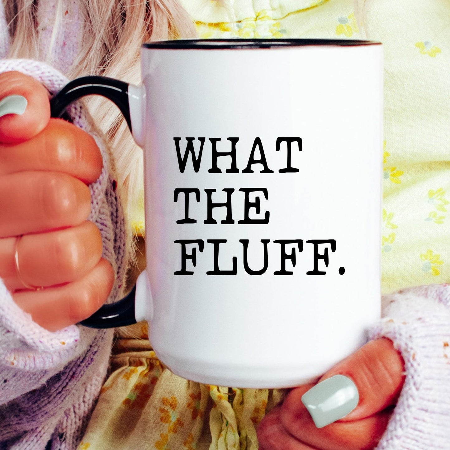 What the Fluff coffee mug held by a model