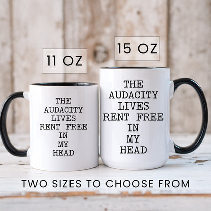 The audacity lives rent free coffee mug