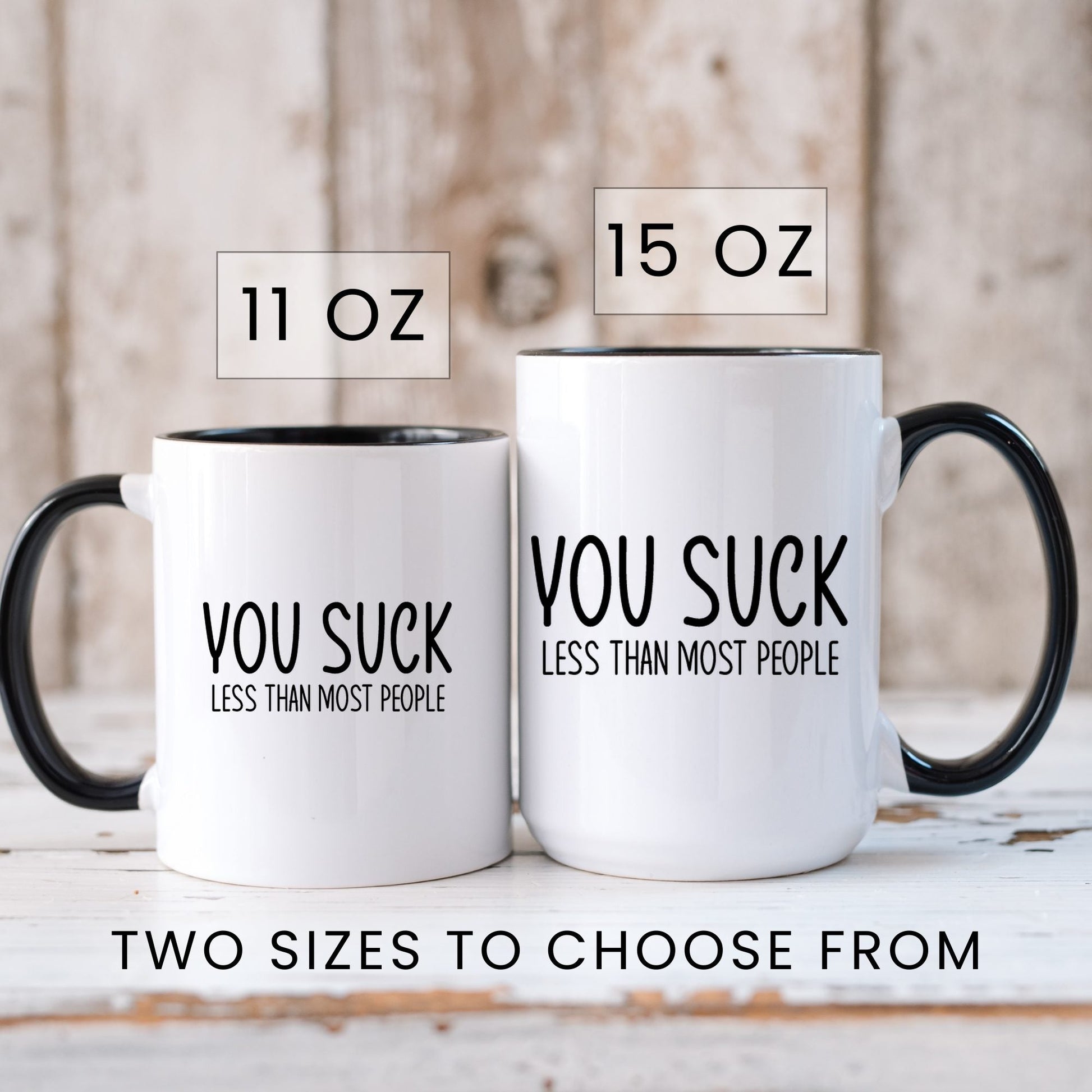 Lifestyle Photo #6 You Suck, Less Than Most Mug