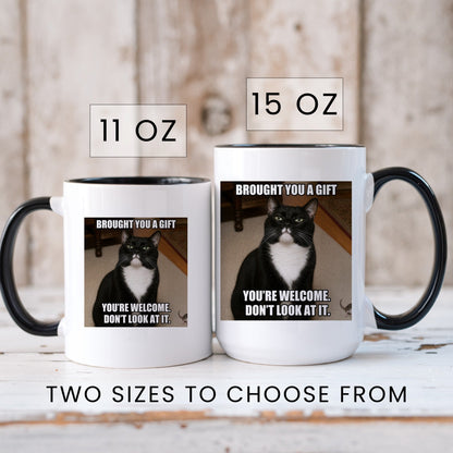 Brought you a gift tuxedo cat coffee mug